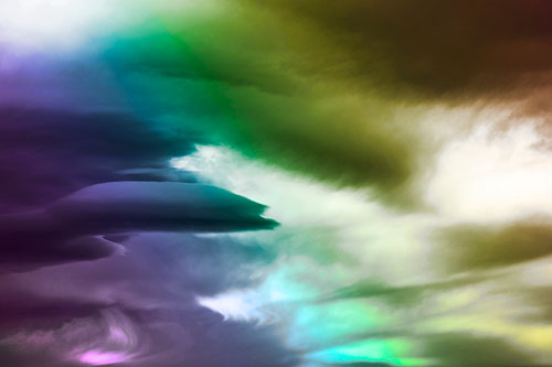 Smooth Cloud Sails Along Swirling Formations (Rainbow Tone Photo)