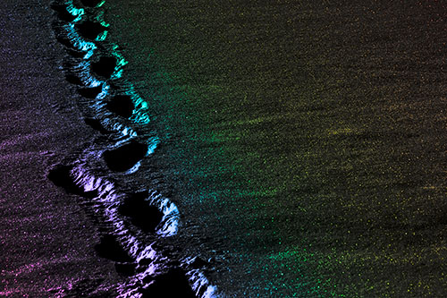Snow Footprints Across Frozen Lake (Rainbow Tone Photo)
