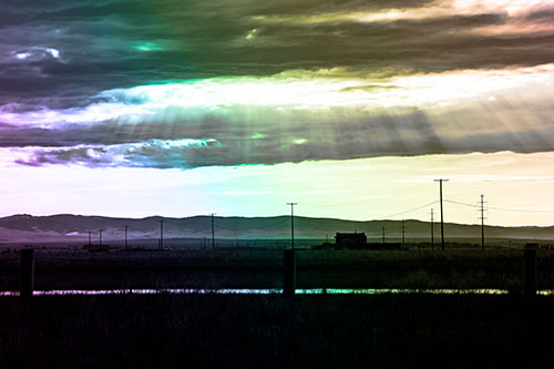Sunlight Bursts Powerline Horizon After Rainstorm (Rainbow Tone Photo)