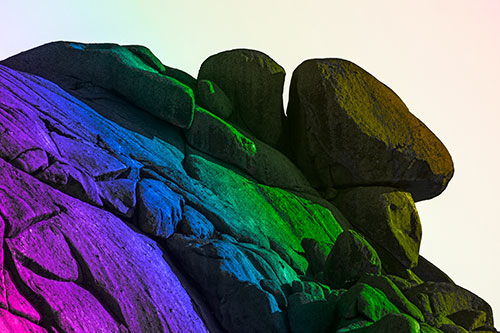 Sunlight Casting Shadows On Mountain Of Rocks (Rainbow Tone Photo)