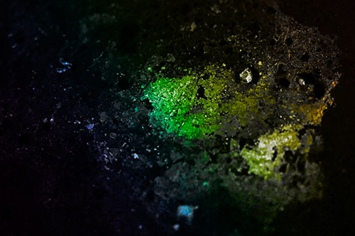 Wide Eyed Oil Demon Face Floating Atop Water (Rainbow Tone)