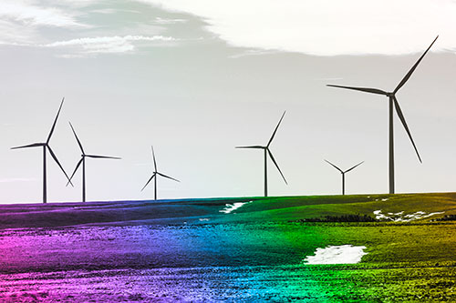 Wind Turbines Scattered Around Melting Snow Patches (Rainbow Tone Photo)