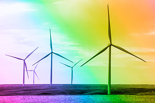 Wind Turbines Standing Tall On Green Pasture (Rainbow Tone Photo)