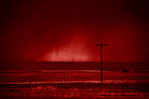 Distant Thunderstorm Rains Down Upon Powerlines (Red Shade Photo)