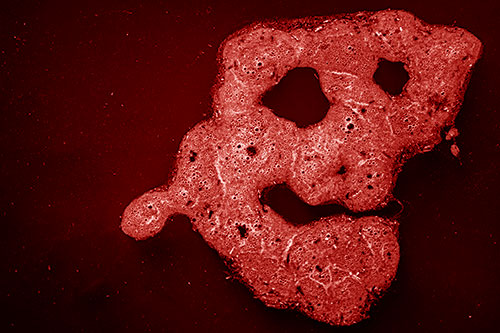 Droopy Smiling Bubble Face Floating Above Soil (Red Shade)