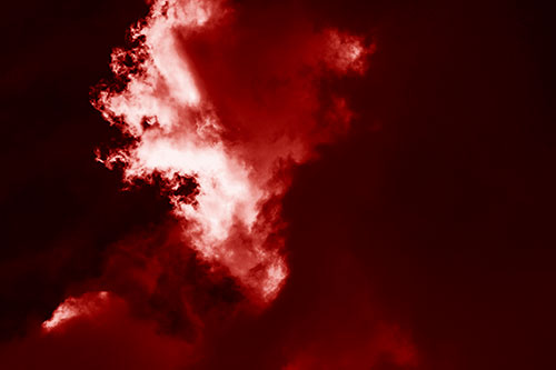 Evil Cloud Face Snarls Among Sky (Red Shade Photo)