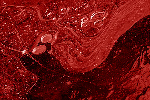 Frozen Bubble Clusters Among Twirling River Ice (Red Shade Photo)