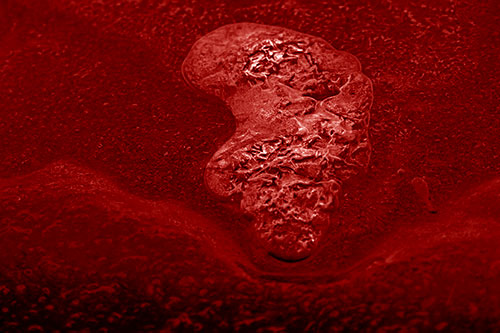 Frozen Water Bubble Mass Formation Along River (Red Shade Photo)