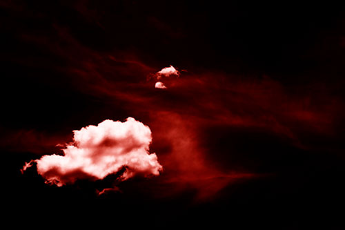 Isolated Creature Head Cloud Appears Within Darkness (Red Shade Photo)