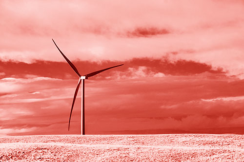 Lone Wind Turbine Standing Along Dry Prairie Horizon (Red Shade Photo)