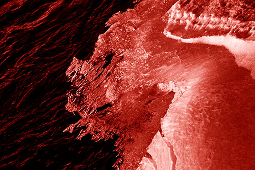 Melting Ice Face Creature Atop River Water (Red Shade)