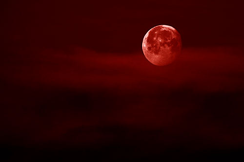 Moon Sets Behind Faint Clouds (Red Shade Photo)