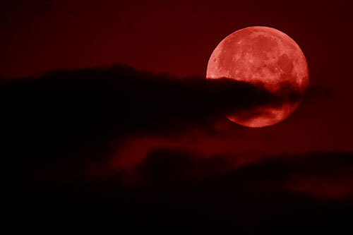 Pac Man Moon Swallows Clouds (Red Shade Photo)