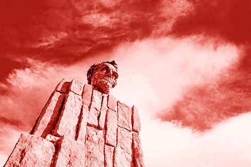 Presidents Statue Standing Tall Among Clouds (Red Shade Photo)