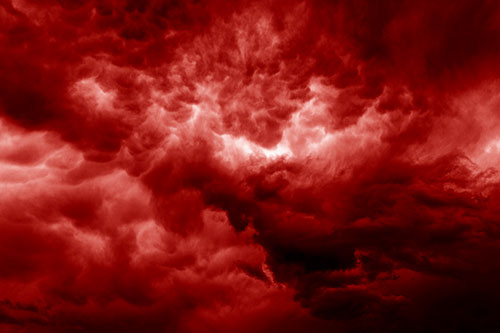 Raging Thunderstorm Clouds Brewing Among Sky (Red Shade)