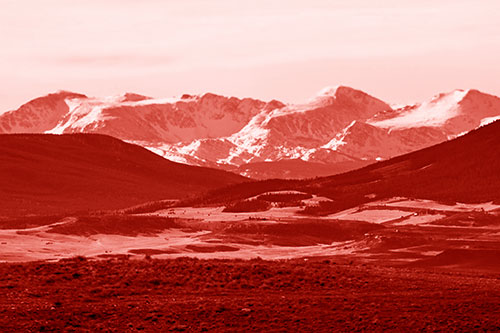 Snow Capped Mountains Behind Hills (Red Shade Photo)