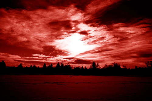 Sun Vortex Illuminates Clouds Above Dark Lit Lake (Red Shade Photo)