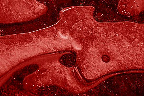 Swirling Frozen Smiling Bubble Eyed River Ice Face (Red Shade)