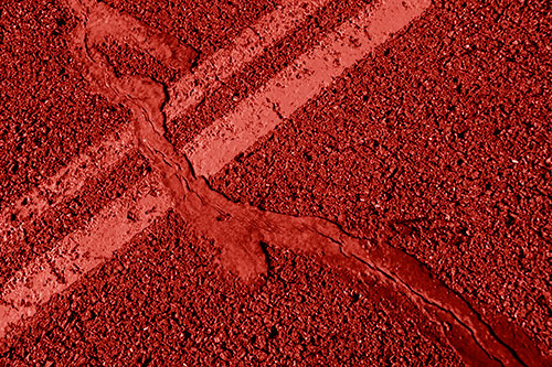 Tar Creeping Over Sidewalk Pavement Lane Marks (Red Shade Photo)