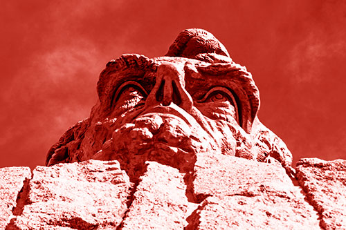 Vertical Upwards View Of Presidents Statue Head (Red Shade Photo)