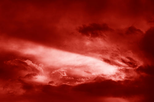 White Light Tearing Through Clouds (Red Shade Photo)