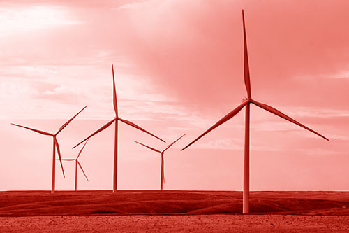Wind Turbines Standing Tall On Green Pasture (Red Shade Photo)