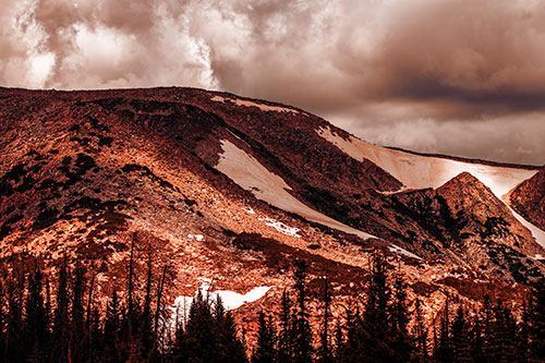Clouds Cover Melted Snowy Mountain Range (Red Tint Photo)