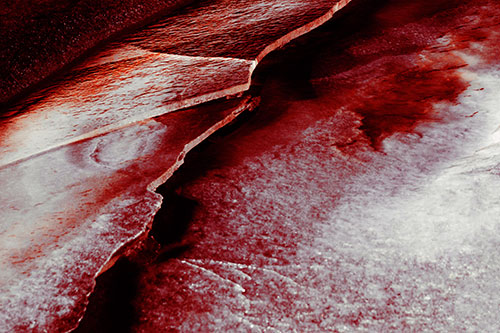 Cracking Blood Frozen Ice River (Red Tint Photo)