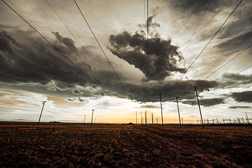 Creature Cloud Formation Above Powerlines (Red Tint)