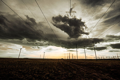 Creature Cloud Formation Above Powerlines (Red Tint Photo)
