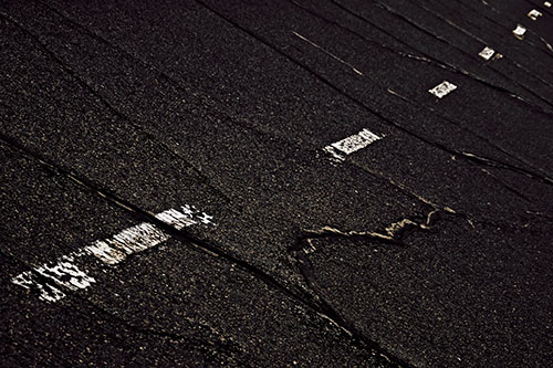 Decomposing Pavement Markings Along Sidewalk (Red Tint Photo)