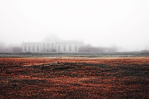 Dense Fog Consumes Distant Historic State Penitentiary (Red Tint Photo)