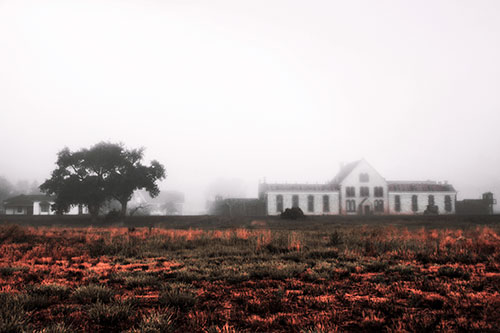 Departing Fog Reveals State Penitentiary (Red Tint Photo)