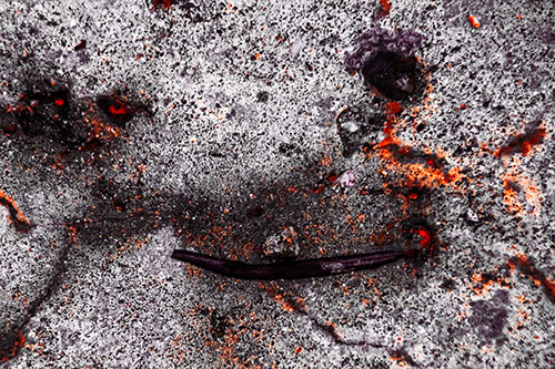 Evil Eyed Concrete Face Evaporating (Red Tint Photo)