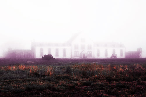 Fog Engulfs Historic State Penitentiary (Red Tint Photo)