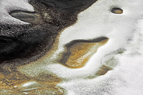 Joyful Ice Face Frozen Atop River (Red Tint)
