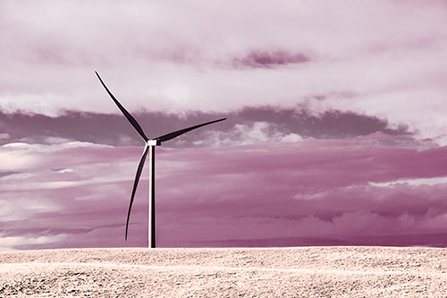 Lone Wind Turbine Standing Along Dry Prairie Horizon (Red Tint Photo)