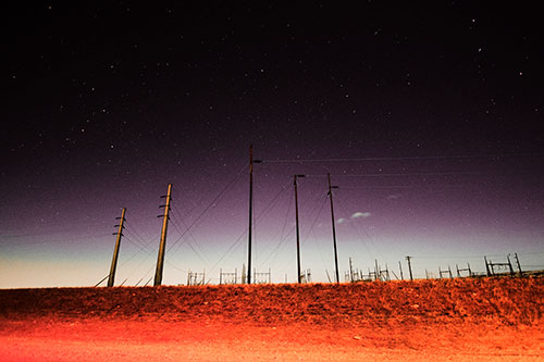Powerlines Among The Night Stars (Red Tint Photo)