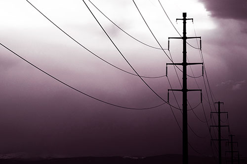 Powerlines Receding Into Thunderstorm (Red Tint Photo)