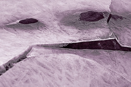 Rock Face Emerges Among Cracked Frozen Ice (Red Tint)