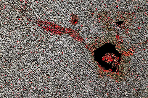 Screaming Wet Asphalt Face Cracking Apart (Red Tint)