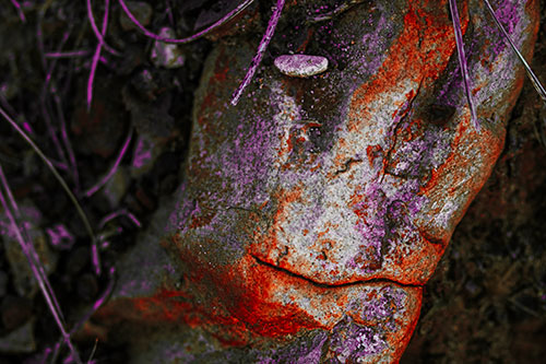 Smirking Battered Rock Face (Red Tint)