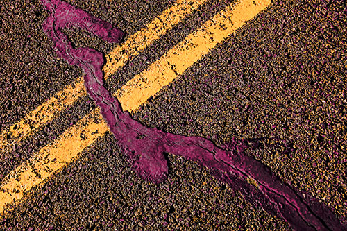 Tar Creeping Over Sidewalk Pavement Lane Marks (Red Tint Photo)