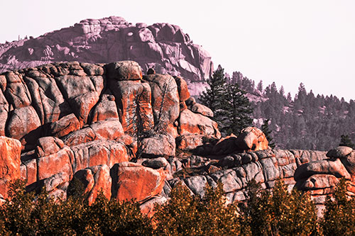 Two Towering Rock Formation Mountains (Red Tint Photo)