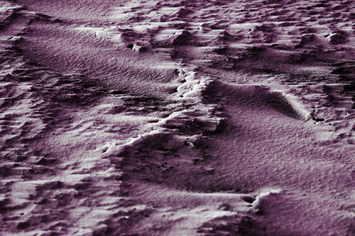 Wind Blowing Across Jagged Frozen Snow Drift (Red Tint Photo)