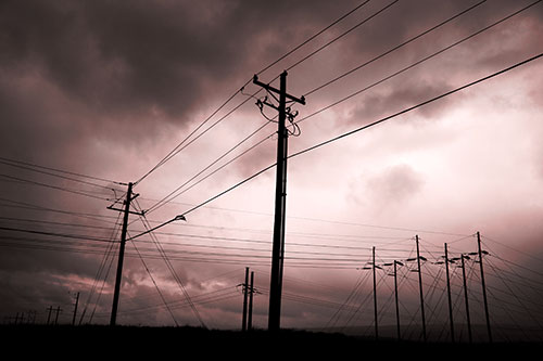 Crossing Powerlines Beneath Rainstorm (Red Tone Photo)