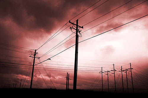 Crossing Powerlines Beneath Rainstorm (Red Tone Photo)