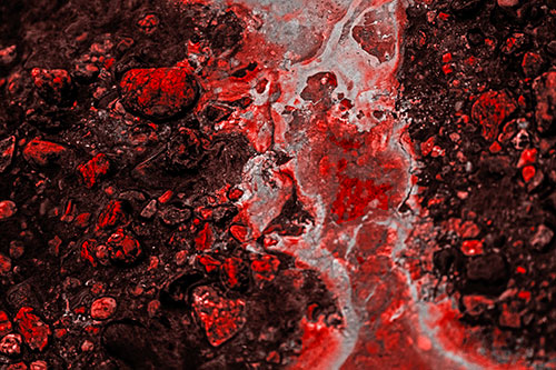 Distorted Oil Face Smearing Among Rocky Shore (Red Tone)