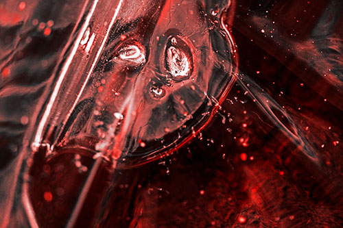 Frozen Unhappy Frowning Distorted River Ice Face (Red Tone Photo)