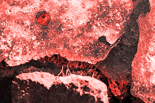 Ice Melting Crevice Mouthed Rock Face (Red Tone Photo)